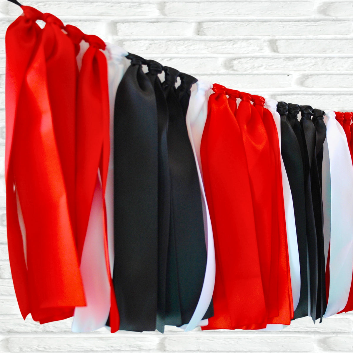 Red black white ribbon bunting - The Party Teacher  - left side view