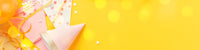 pink party hats on yellow background