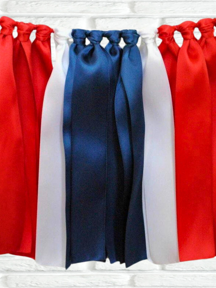 Navy red white ribbon bunting - The Party Teacher - hero image