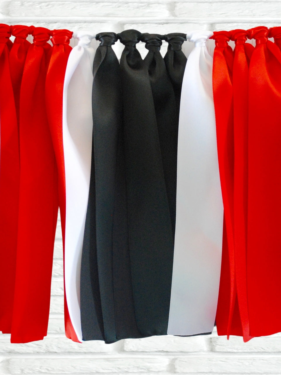 Red black white ribbon bunting - The Party Teacher - hero image