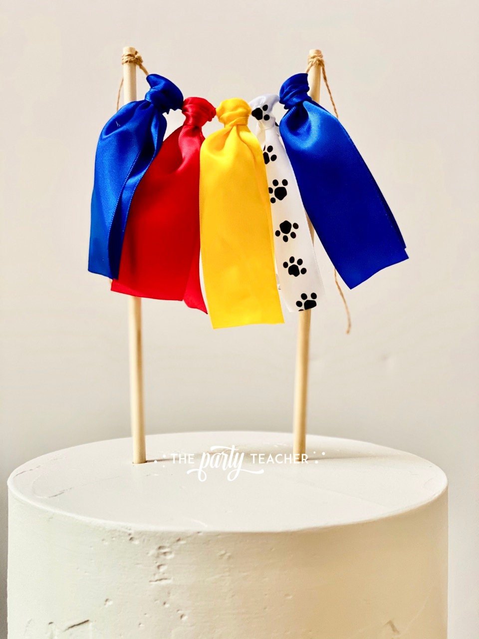 Paw Print Ribbon Cake Topper - The Party Teacher