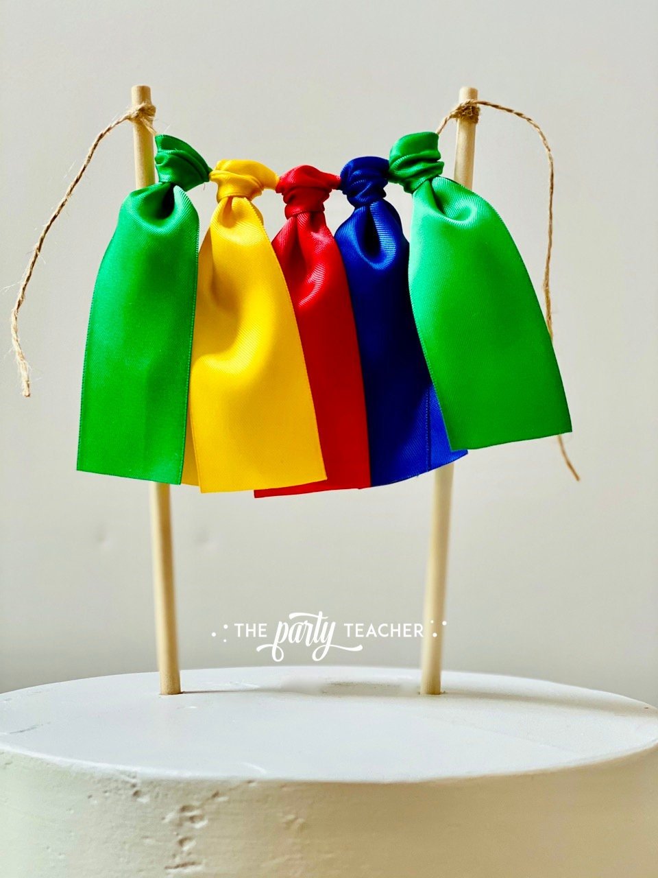 Primary Colors Ribbon Cake Topper - The Party Teacher
